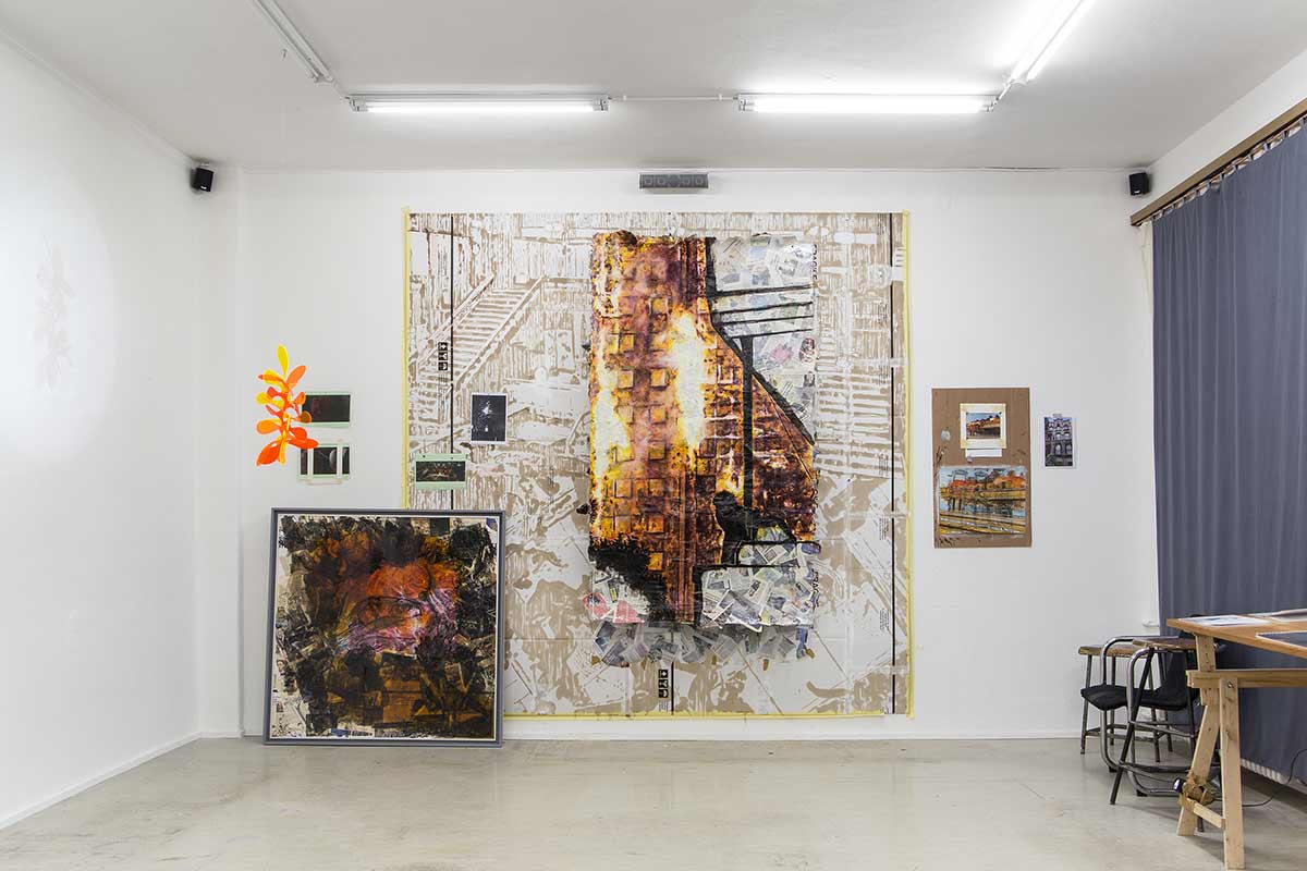 painting of burning Grenfell Tower surrounded by several other paintings