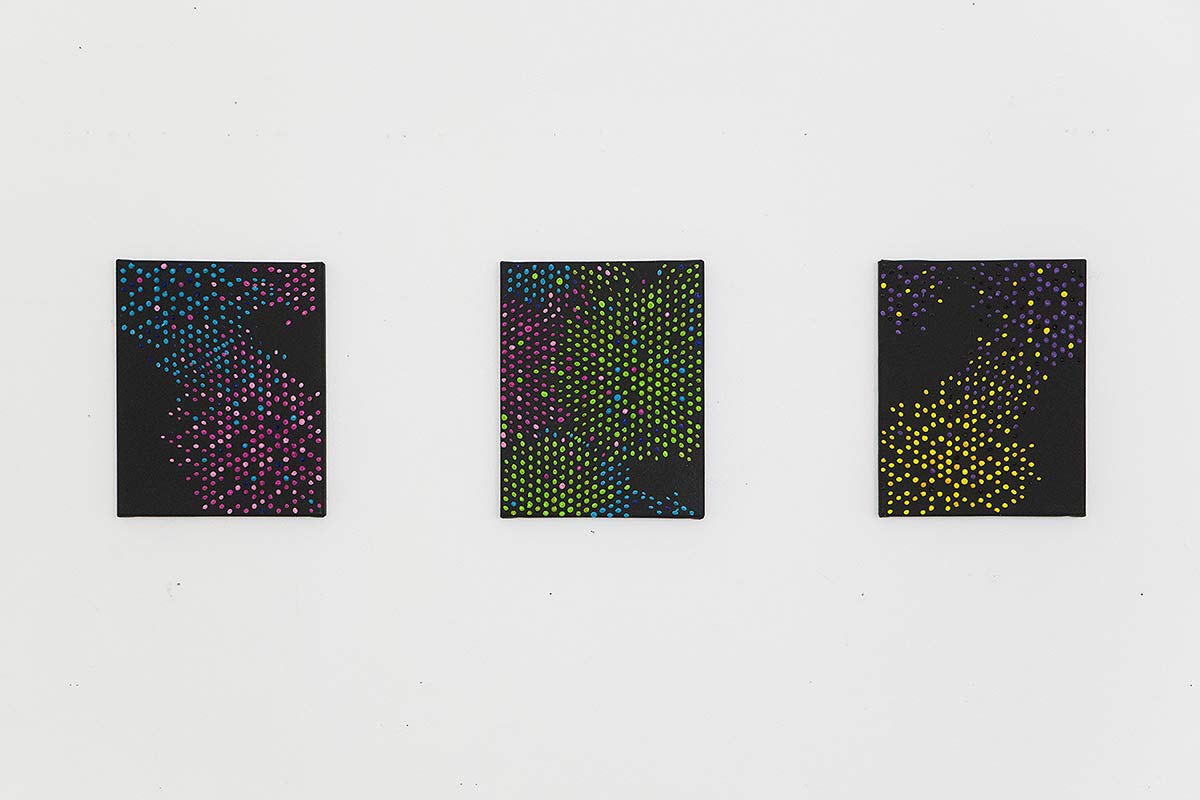 three abstract paintings of colourful dots on black canvas
