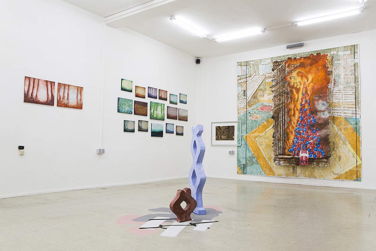 abstract painting and paintings of a burning christmas tree, sculpture in foreground